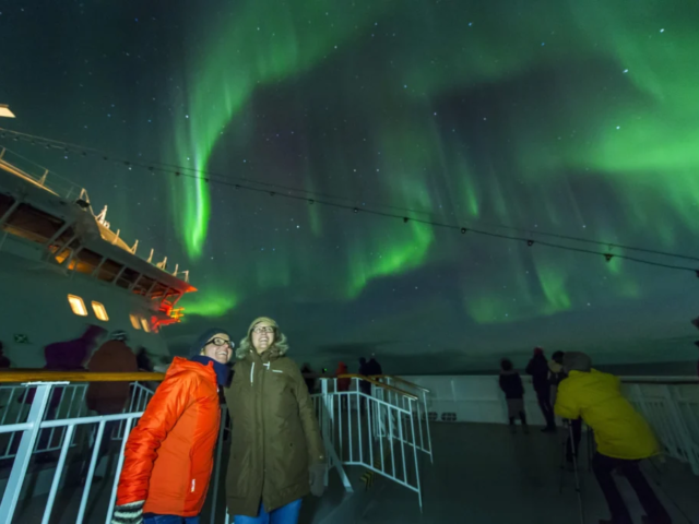 Passengers Experiencing the Northen Lights