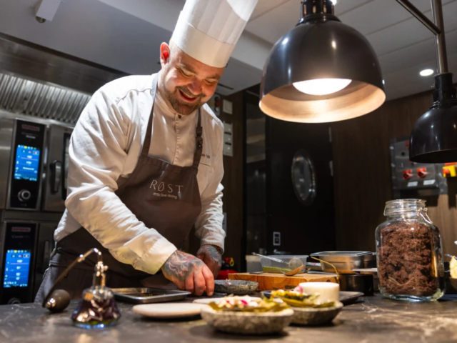 Preparing delicacies for guests in restaurant Røst on board